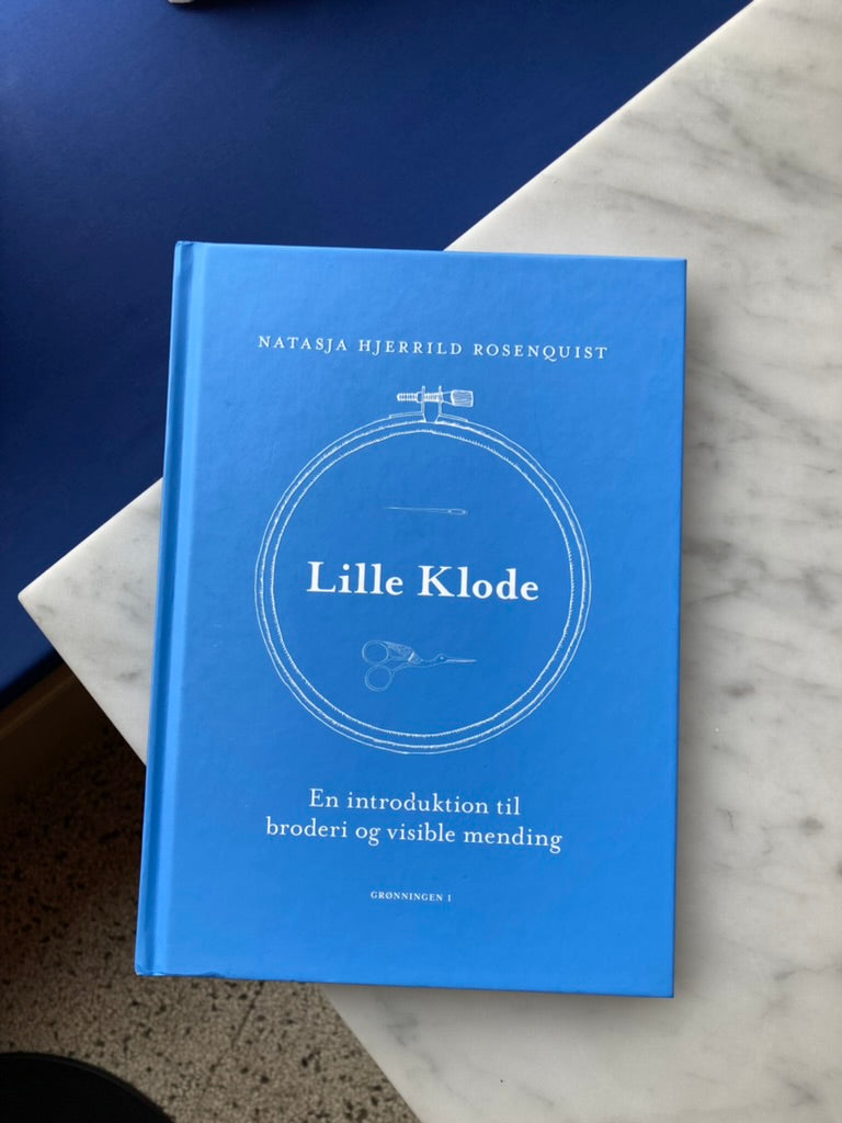 Broderi i Grato med Lille Klode